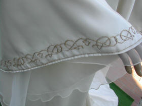 Broderies de l'ourlet des manches